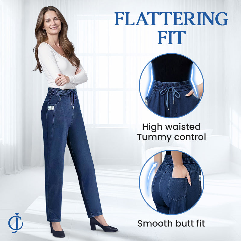 Side profile of a woman wearing the dark grey ultra-stretch mom jeans, illustrating the flattering silhouette.