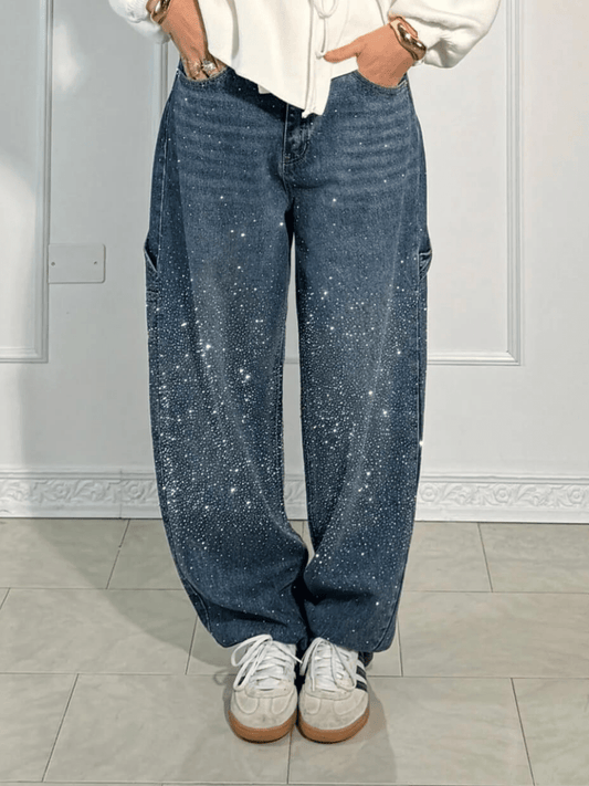 Front view of dark blue women's balloon carpenter jeans, showcasing the relaxed fit and utility pockets.