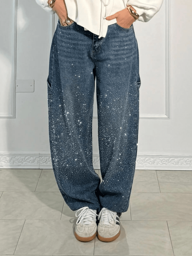 Front view of dark blue women's balloon carpenter jeans, showcasing the relaxed fit and utility pockets.