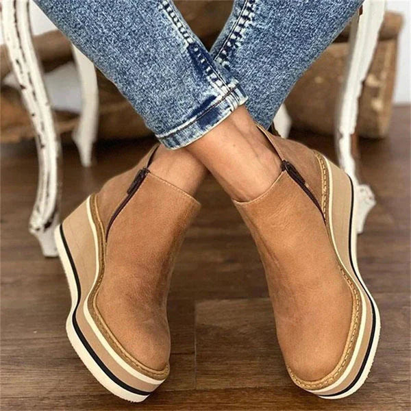Front view of khaki Zara women's low ankle boots, showcasing the sleek design and sturdy sole.