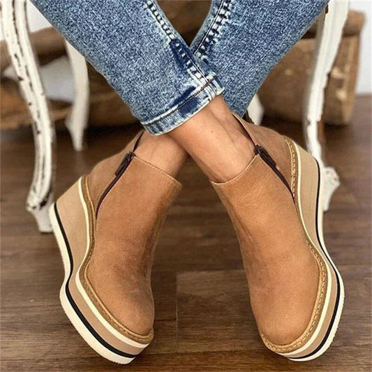 Front view of khaki Zara women's low ankle boots, showcasing the sleek design and sturdy sole.