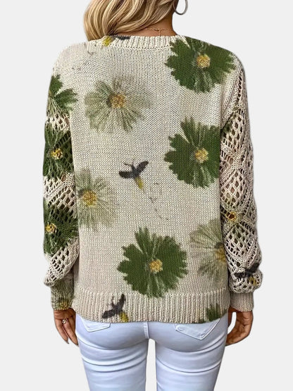 Purple floral knit V-neck sweater in a studio lighting, showcasing its true colour.