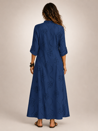 Group shot of various colour options for the Lotte floral flowing maxi dress, displayed beautifully.