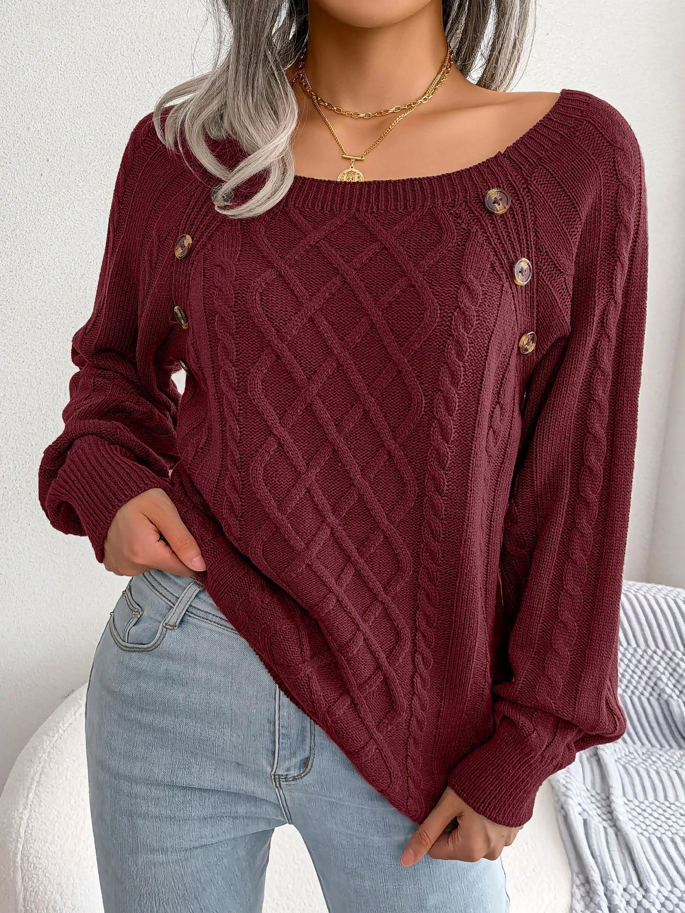Close-up of the textured knit pattern on the Lotte casual knitted sweater in purple.