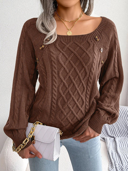 Side profile of a model wearing the Lotte casual knitted sweater in blue, paired with jeans.
