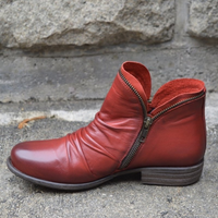 Overhead view of a yellow Hadley ankle boot, displaying the comfortable footbed and interior lining.