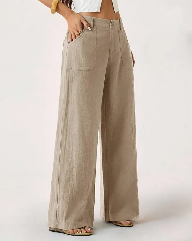 Rear view of the coffee casual trousers, demonstrating the clean lines and back pocket styling.