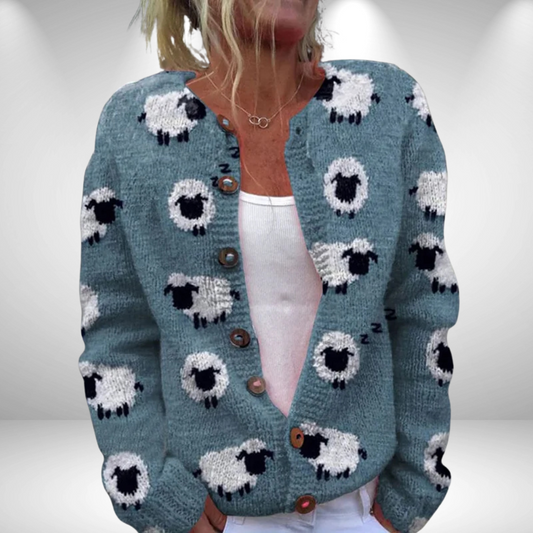Front view of a woman wearing the Mila printed loose cardigan in a light colour, styled casually.