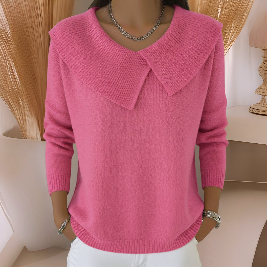 Close-up detail of the green knitted soft collar sweater's unique collar design and subtle pleating.