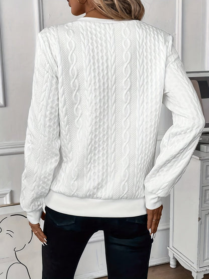 Close-up detail of the soft knitted texture on the Alessia jumper sleeve.