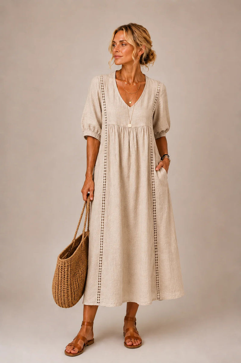 Front view of the Naomi elegant lace linen dress in a light colour, showcasing its relaxed fit.