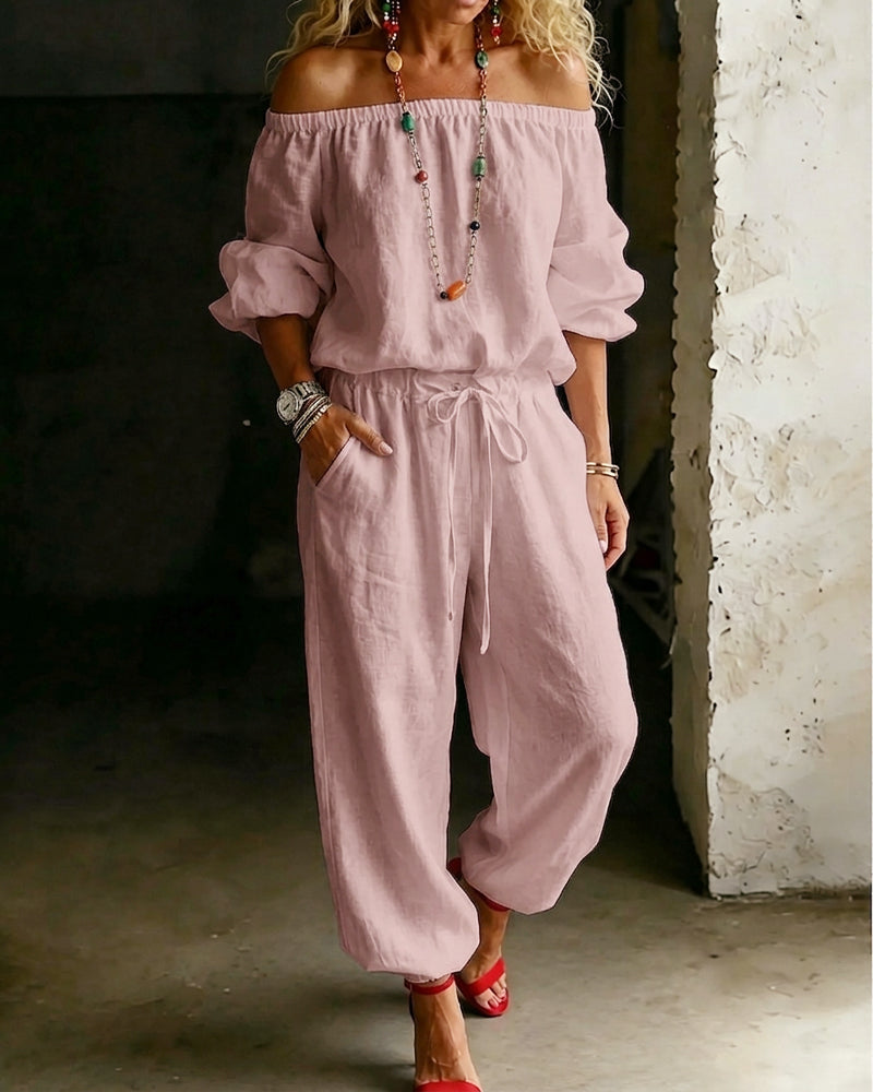 Model posing casually in the Rhiannon comfortable jumpsuit, showcasing its suitability for various body types.