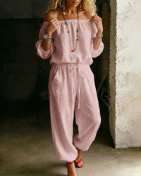 Close-up of the fabric weave and solid colour of the Rhiannon summer jumpsuit, indicating quality.