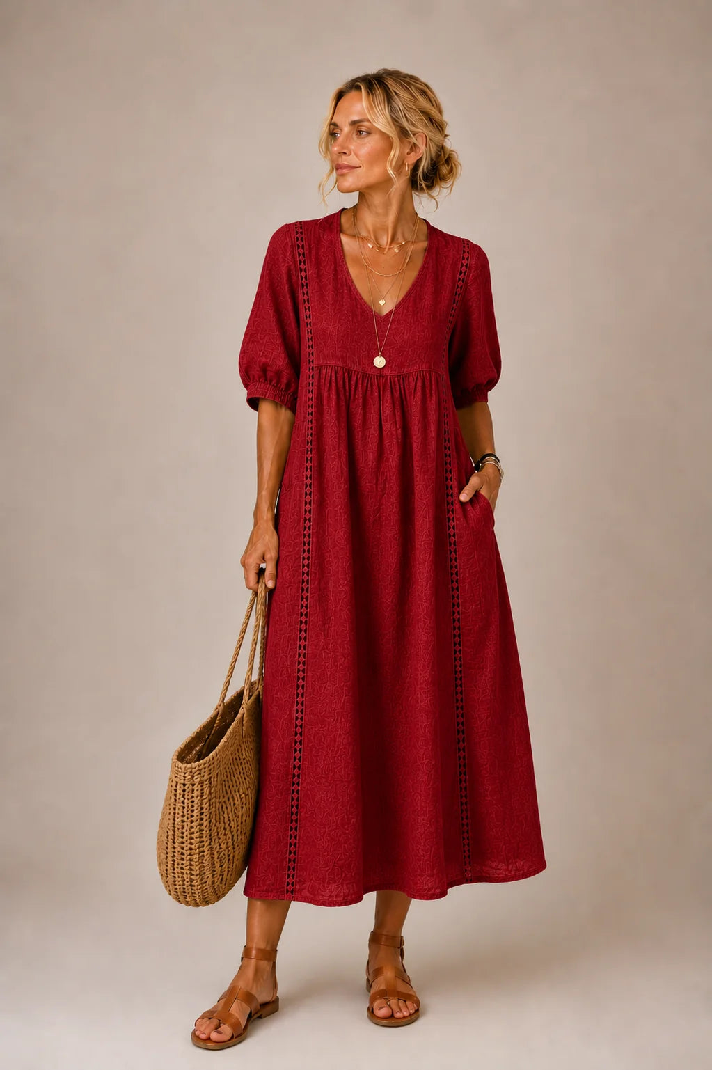 Side profile of the Naomi elegant lace linen dress, highlighting the flow of the breathable fabric.