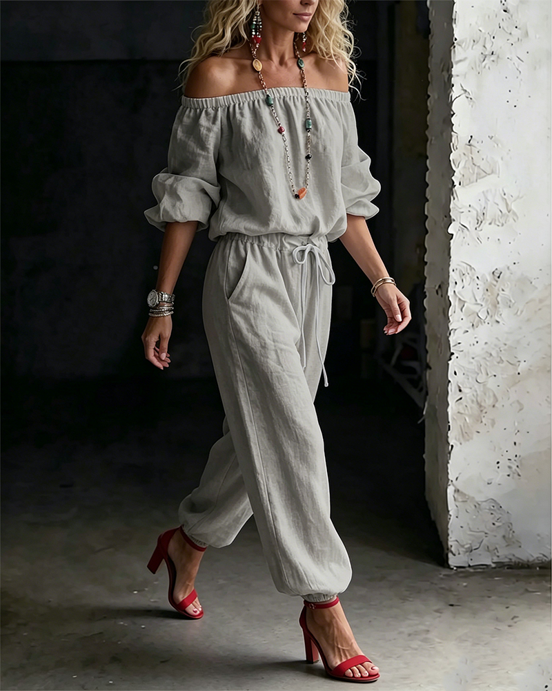 Detailed shot of the stitching and craftsmanship on the Rhiannon off-shoulder summer jumpsuit.