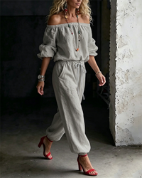 Detailed shot of the stitching and craftsmanship on the Rhiannon off-shoulder summer jumpsuit.