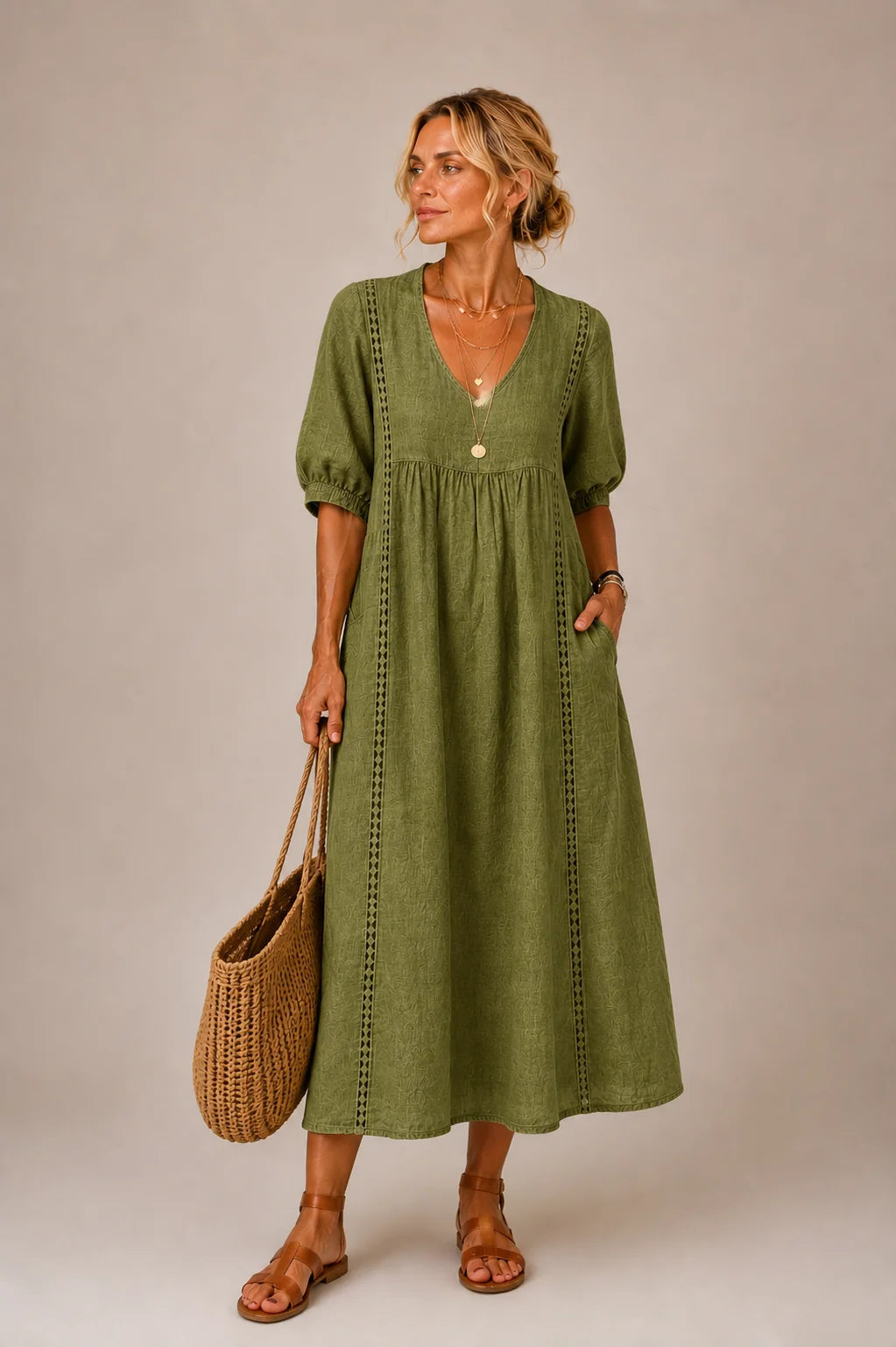 Back view of the Naomi elegant lace linen dress, showing its comfortable and flattering silhouette.