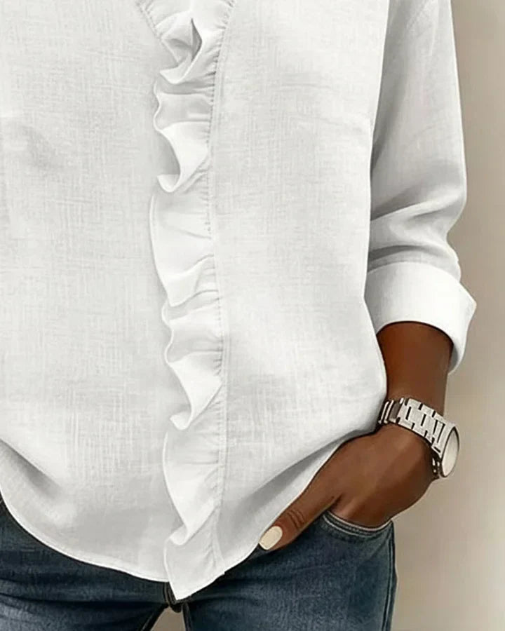 Detail of the fabric texture of the Persephone blouse, emphasising its lightweight and flowing nature.