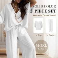 Side profile of a woman showcasing the relaxed fit of the pink comfortable loungewear set, standing outdoors.