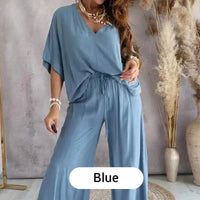 Overhead flat lay of the folded blue comfortable loungewear set, showing both top and bottom pieces.