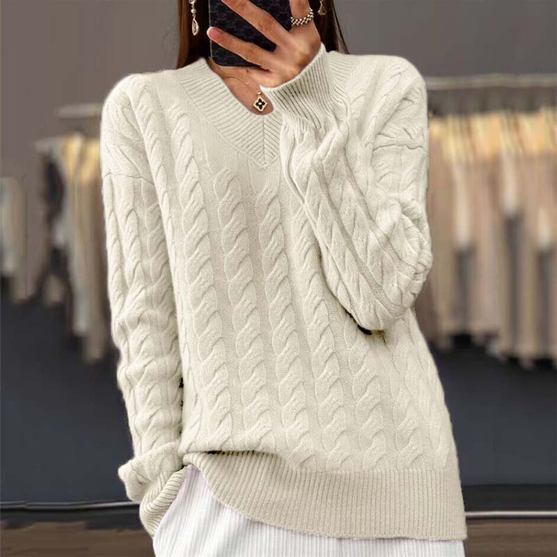 Front view of the Rosalie Classic Cable Knit Sweater in a neutral tone, showcasing its intricate pattern.