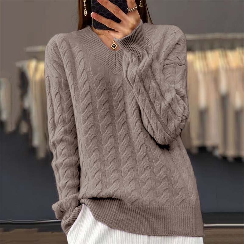 Side profile of the Rosalie sweater, highlighting its comfortable drape and flattering silhouette.