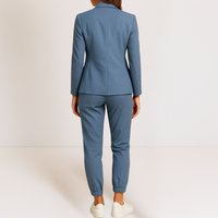 Close-up detail of the fabric and stitching of the Saskia women's tailored jacket, showing quality.