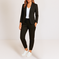 Lifestyle shot of the Saskia women's tailored jacket paired with casual trousers, perfect for daily wear.