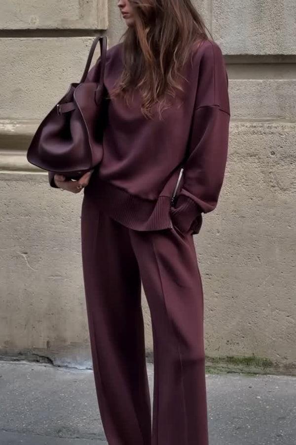 Front view of the Solstice burgundy matching top and wide leg trousers set on a model, showcasing the relaxed fit.