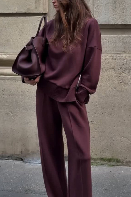 Front view of the Solstice burgundy matching top and wide leg trousers set on a model, showcasing the relaxed fit.