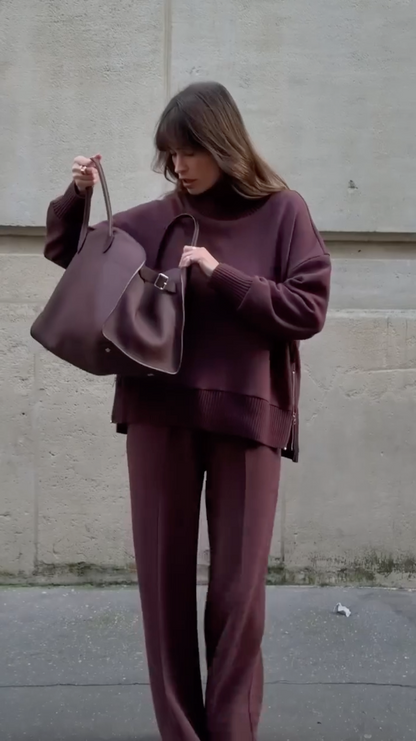 Rear view of the Solstice burgundy matching top and wide leg trousers set, showing the clean lines and drape of the fabric.