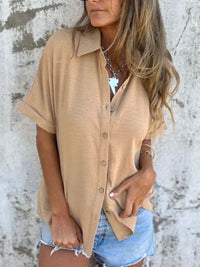Flat lay of the Seraphina classic collared shirt in dusty pink, showcasing its simple elegance.