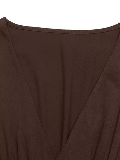 Full length shot of the brown Zara midi dress, illustrating its flattering A-line cut and movement.